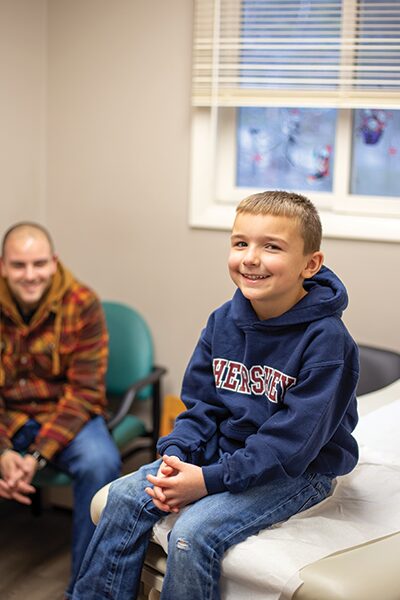 child and father at primary care visit